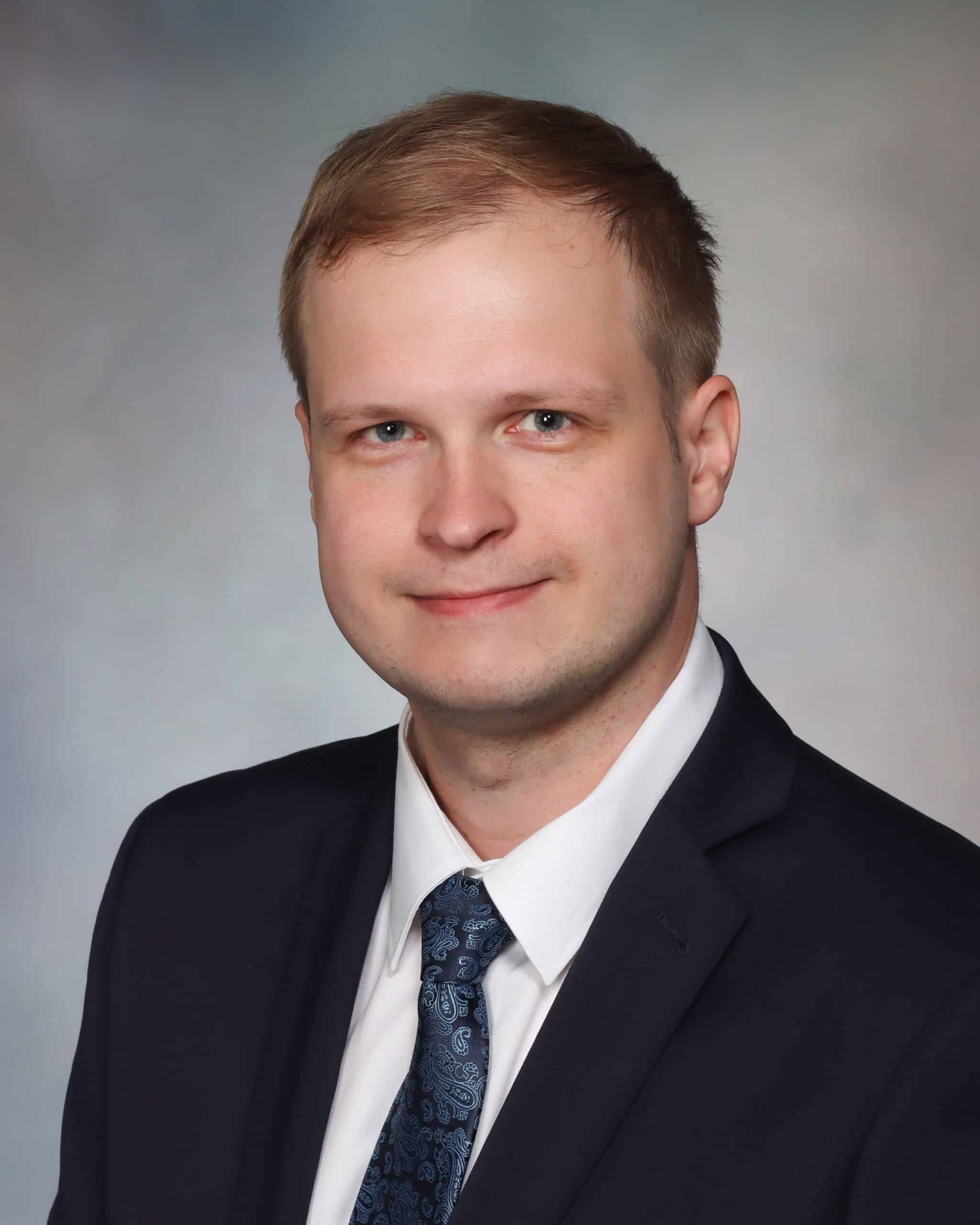 Dr Tomasz Chmiela